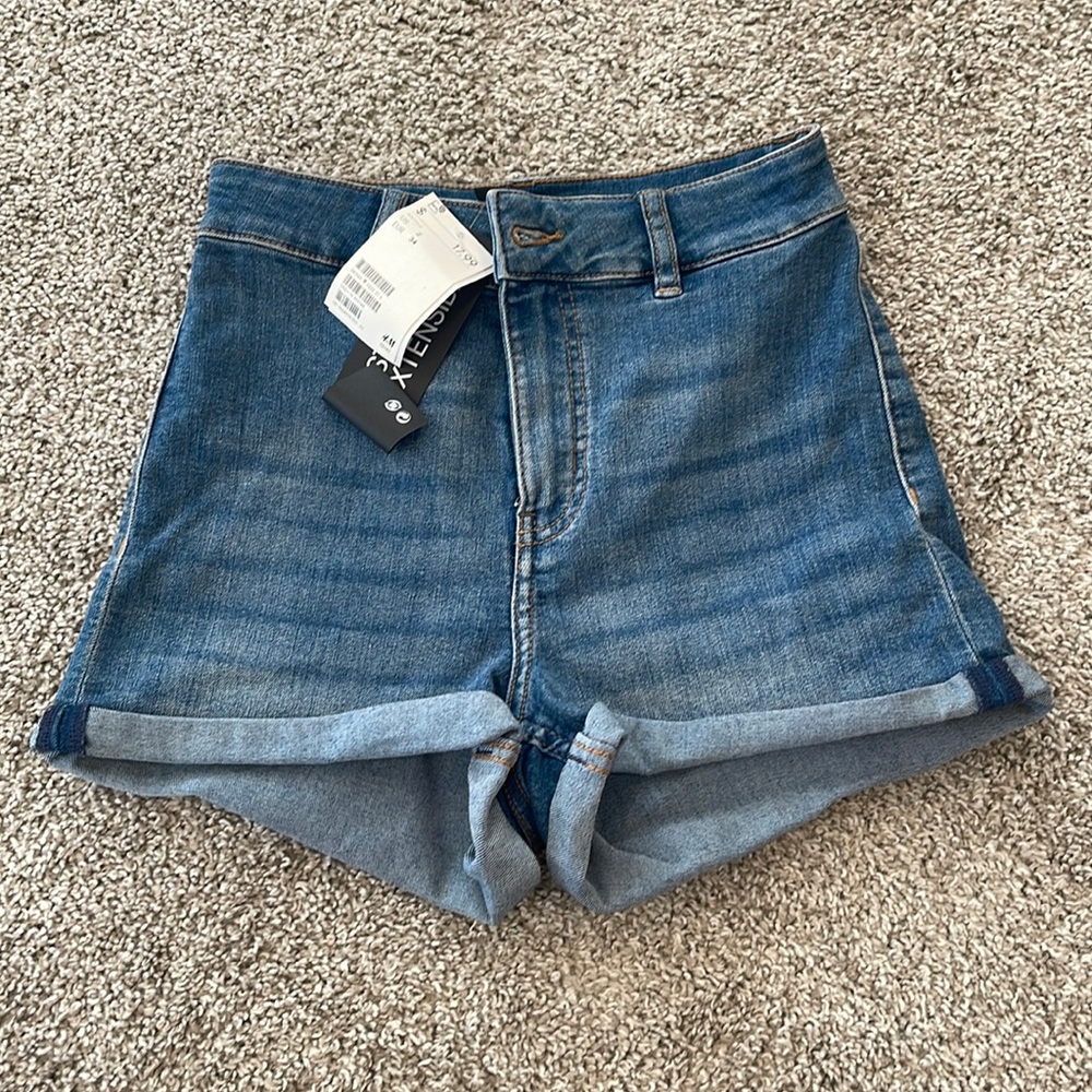 Never been worn blue high waisted shorts. H&M size 2